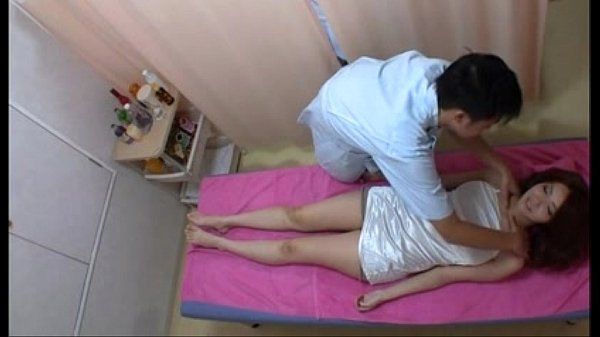 Oriental girl doing massage caught